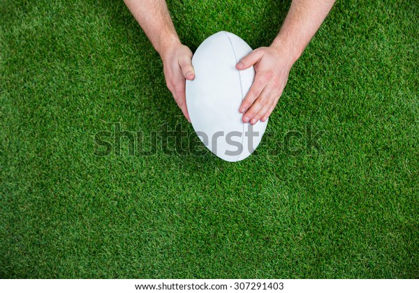 Rugby player\
scoring a try on astro turf\
grass