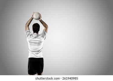 Rugby Player In A White Uniform On A White Background.