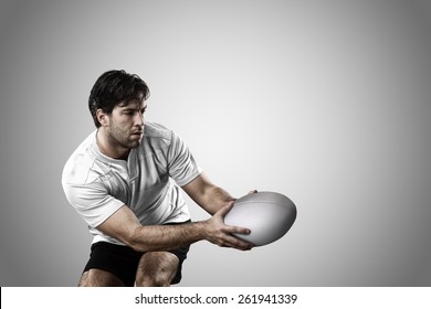 Rugby Player In A White Uniform On A White Background.