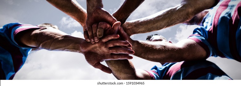 Rugby players against sky and cloud on a sunny day - Powered by Shutterstock