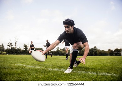 Rugby Players Training On Pitch At The Park