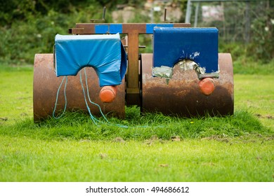 Rugby Scrum Machine From Front. Old And Rusty Rugby Scrummage Training Device On Pitch Near Bath, In Somerset, UK