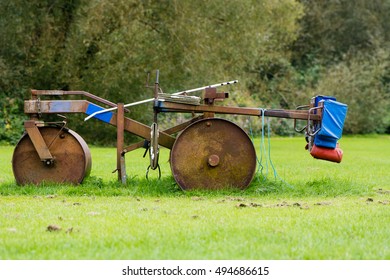 Rugby Scrum Machine In Profile. Old And Rusty Rugby Scrummage Training Device On Pitch Near Bath, In Somerset, UK