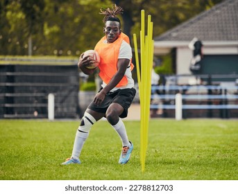 Rugby, sports and black man training with equipment ready for match, practice and sport games. Fitness, performance and serious male athlete running for warm up, exercise and workout for competition - Powered by Shutterstock