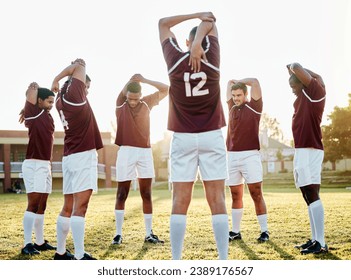 Rugby, sports and stretching with a team getting ready for training or competitive game on a field. Fitness, sport and preparation with a man athlete group in a warm up before an outdoor summer match - Powered by Shutterstock