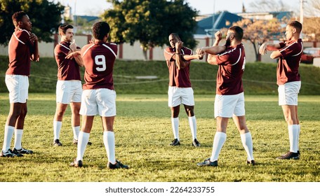 Rugby, sports and warm up with a team getting ready for training or a competitive game on a field. Fitness, sport and stretching with a man athlete group in preparation of a match outdoor in summer - Powered by Shutterstock