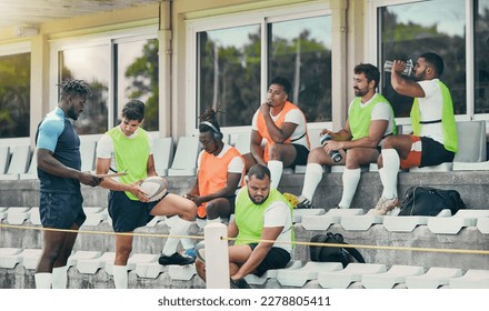 Rugby team, coaching and clipboard of people planning strategy or checklist for event, game formation or match at stadium. Diversity group, sports men and training manager goals, advice or mission - Powered by Shutterstock