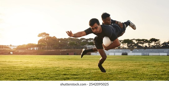 Rugby, team and men tackle at field for game, competition and training banner outdoor. Sport, challenge and block strong player with ball in match for defense action, fight and fitness at sunset - Powered by Shutterstock