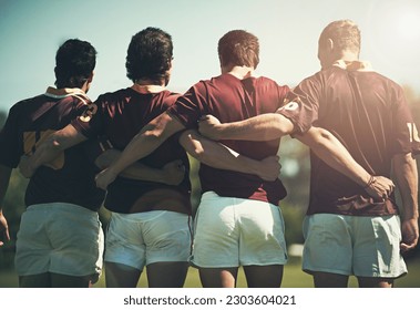 Rugby team, sports and men together outdoor on a pitch for scrum, hug or huddle. Male athlete group playing in sport competition, game or training match for fitness, workout or teamwork exercise - Powered by Shutterstock