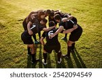 Rugby, team and talking together for huddle, motivation and game field for match preparation. Above sports, fitness and group of men outdoor with competition planning, club and practice with exercise