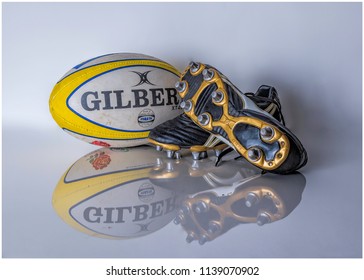 Rugby Warwickshire UK 08/14/2017. Rugby Ball And Boots With Reflection. 