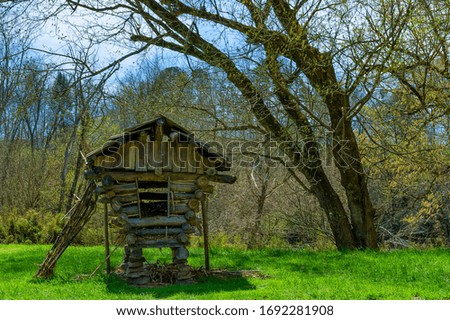 Rugged out building made of logs sits on David Crockette Birthplace State Park in Limestone,Tennessee.