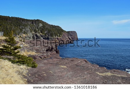 rugged shoreline landscape along the East Coast trail, Stiles Cove Path near Flatrock Newfoundland Canada; early Spring 