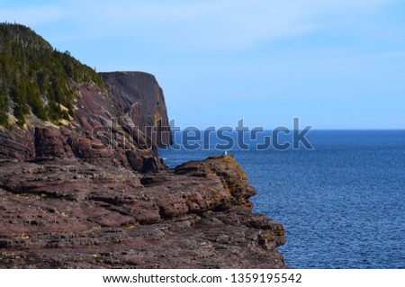 rugged shoreline landscape along he East Coast trail, Stiles Cove Path near Flatrock Newfoundland Canada;  early Spring 