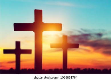 Rugged Silhouette Cross On Sunset Background