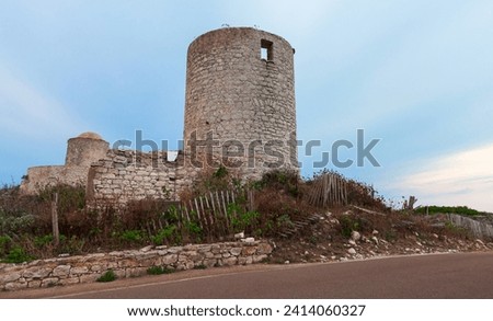 Ruined abandoned stone windmill. Bonifacio, Corsica island, France