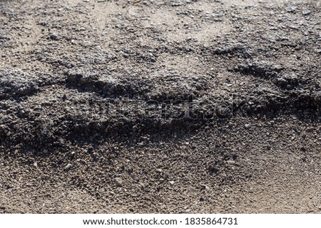 Similar – Potholes in asphalt / road damage