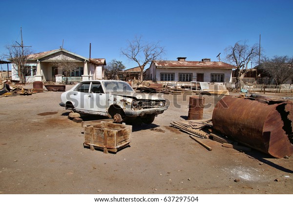 Ruined car in deserted ghost town of Humberstone\
near Iquique, Chile