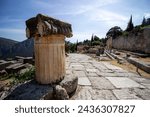 Ruined columns of Delphi. Archaeological site in Greece. Greek religious sanctuaries to the god Apollo. UNESCO World Heritage. View of ancient Delphi columns.