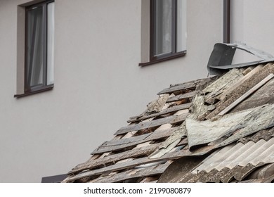 Ruined Roof. Consequences Of The Blast Wave. Surviving Housing. Reconstruction Of Cities And Villages. Torn Slate.