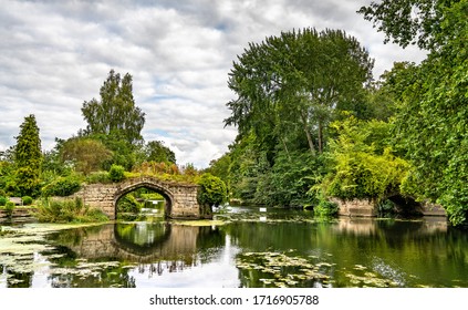 Ruined stone bridge across the Avon river in Warwick, England