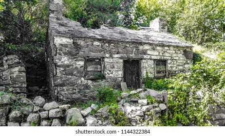 ruined stone and flint cottage