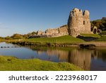 Ruins of a 12th century Welsh castle in the rural countryside (Ogmore Castle, Vale of Glamorgan)