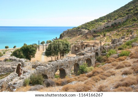 ruins of the ancient coastal city Anamurium, citadel with aqueduct still partly intact along the hill