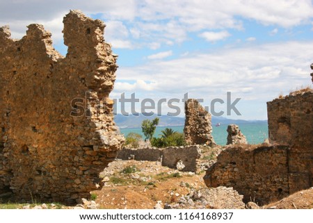 ruins of the ancient coastal city Anamurium, citadel houses, walls broken but still partly standing