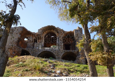 ruins of the ancient coastal city Anamurium, citadel houses, walls broken but still partly standing. Landscape of town Anamur with the beautifully preserved ruins of the ancient city of Anamur, Mersin
