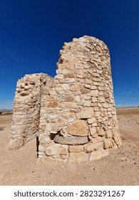 Ruins of ancient stone windmill structure in Campo de Criptana Spain