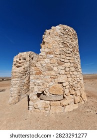 Ruins of ancient stone windmill structure in Campo de Criptana Spain