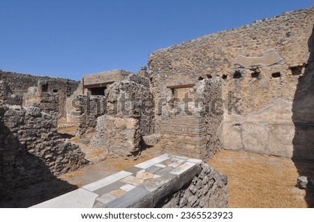 Ruins of the archeological site in the ancient Roman city of Pompeii buried under volcanic ash in the eruption of Mount Vesuvius volcano in 79 AD in Pompeii, Italy