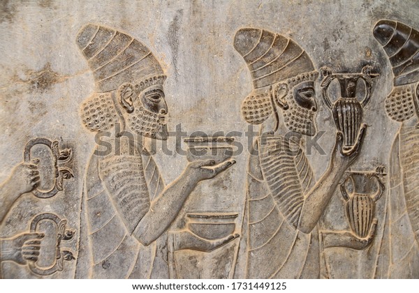 Ruins and bas reliefs carvings of ancient city\
Persepolis, Iran. Capital of the Achaemenid Empire. UNESCO World\
Heritage Site