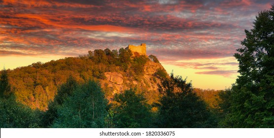 Ruins of Chojnik Castle in Karkonosze mountains at sunset. Poland