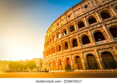 Ruins Of Colosseum View At Sunrise Light In Rome, Italy