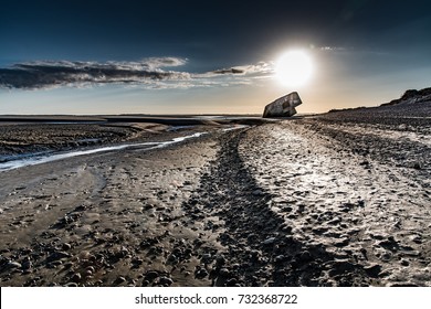 Ruins Of A German Bunker On A Beach In The North Of France At Low Tide