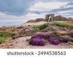 The ruins of Grosnez Castle at dusk. Grosnez Castle is a ruined 14th-century castle in Saint Ouen, situated in Grosnez in the north-west corner of the island of Jersey in the Channel Islands