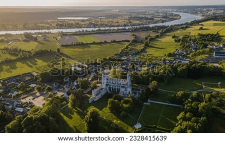 The ruins of the medieval Benedictine Abbey in Jumièges (Normandy, France) above the bends of the Seine, in May, drone photos