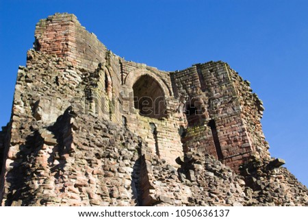 Ruins of Medieval Bothwell Castle Against Blue Sky in South Lanarkshire, Scotland. Photo Showing Remains of Half Arch Windows in Original Stone Wall.