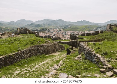 Ruins of the Myrina Castle (Κάστρο Μύρινας) with an aerial view of Lemnos town and mountain ranges, Limnos, Greece, Aegean Seaside - Powered by Shutterstock