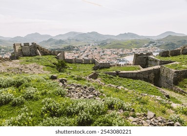 Ruins of the Myrina Castle (Κάστρο Μύρινας) with an aerial view of Lemnos town, Myrina port and mountain ranges, Limnos, Greece, Aegean Seaside - Powered by Shutterstock