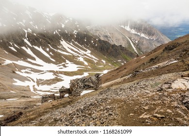 The ruins of the old Bonanza Mine precariously sit high in the mountains above Kennecott on a scree slop. Wrangell St Elias National park, Alaska. - Shutterstock ID 1168261099
