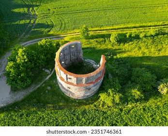Ruins of old rural windmill in Pricovy near Sedlcany. The largest Dutch type mill. Czech Republic. Aerial view from drone.