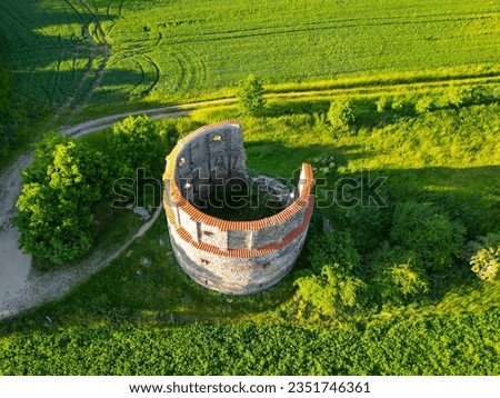Ruins of old rural windmill in Pricovy near Sedlcany. The largest Dutch type mill. Czech Republic. Aerial view from drone.