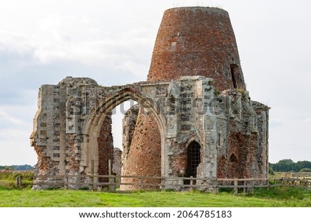 Ruins of St Benet Monastery at Holm near Howe on the Norfolk Broads, England. It was founded before the Norman conquest, but the walls only date from the 14th Century and include a medieval windmill. 