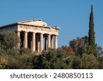 Ruins of Temple of Hephaestus in Ancient Agora in Athens, capital of Greece. Well-preserved Greek temple dedicated to Hephaestus, the Greek god of artisans, blacksmiths, carpenters and craftsmen