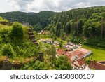 Ruins of Wolfsberg Castle and village Wolfsberg panorama view near Obertrubach in Franconian Switzerland, Germany