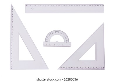 Ruler, squares and a protactor on a white background