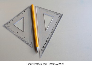 Ruler and yellow pencil. Measurement tool. Inch and metric system.